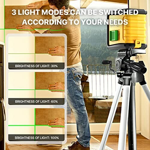 Person using a laser level with adjustable light modes on a tripod.